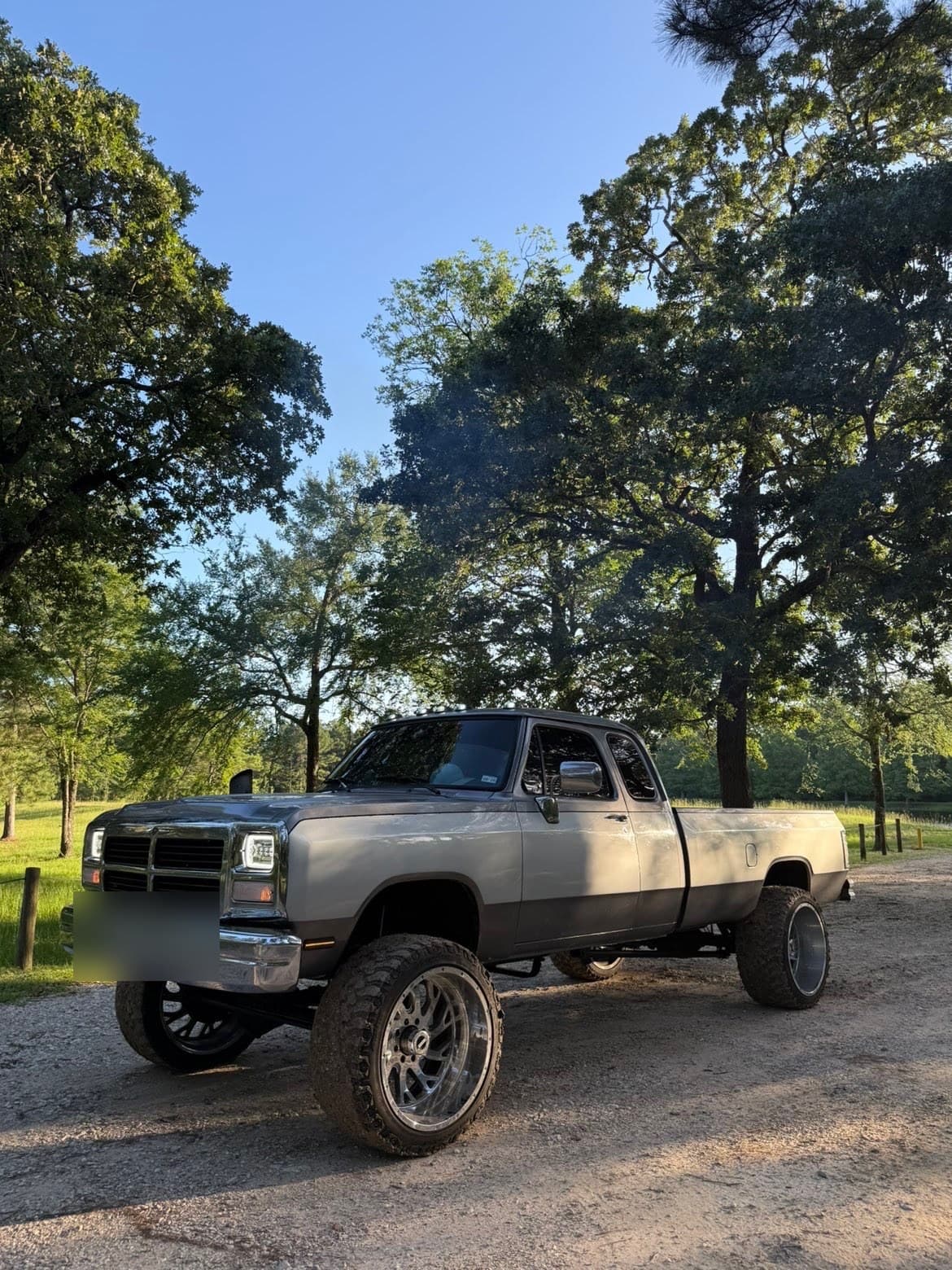 Lifted classic pickup truck on aftermarket wheels, built by Fine Tuned Diesel