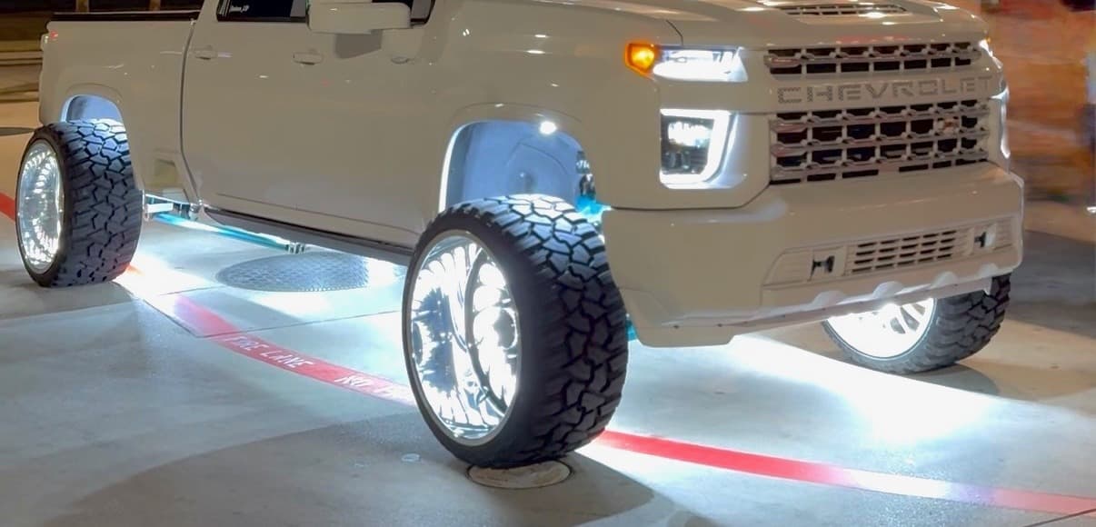 Lifted diesel truck with underglow lighting, tuned by Fine Tuned Diesel
